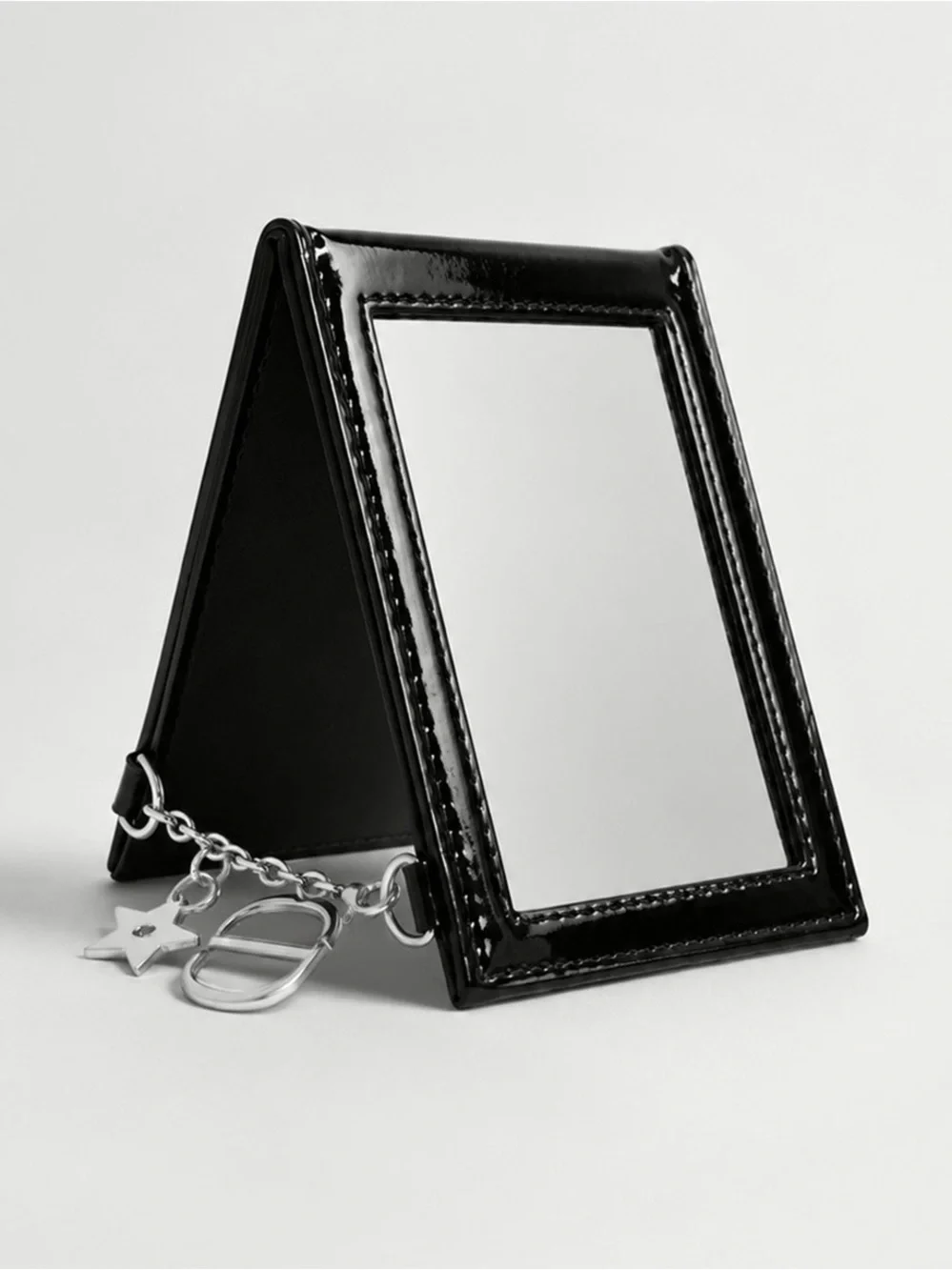 Dior Beauty black patent mirror sku25 Dior pocket-sized folding mirror.